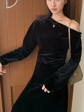 A long-sleeved velvet jacket with a slanted hem for women